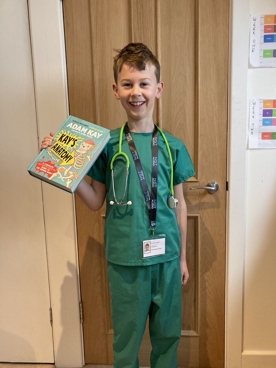SallyCartman's tweet photo. World book day for the smallest boy (weeks later than the rest of the world 🤷‍♀️) - he’s dressed as his favourite author @amateuradam  and begged for green scrubs because he’s firmly Team Xand @xandvt https://t.co/fzl3ddg6sC