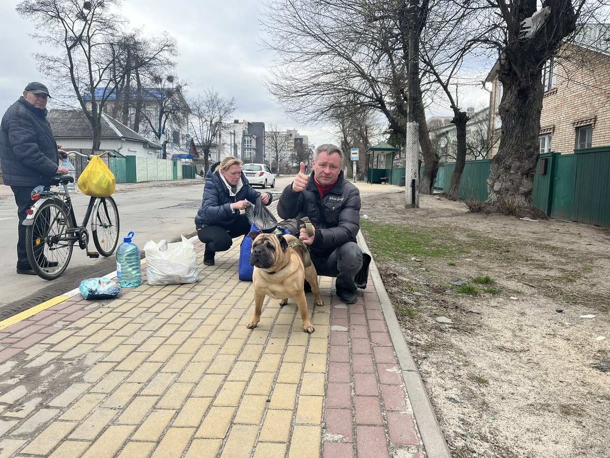 We travelled to the town of Irpin outside of Kyiv to help find the animals left behind..this man with his wife and dog were walking back to their home in Bucha… a soldier told me Bucha does not exist anymore.. 😔 #ukraine #NowzadUkraine