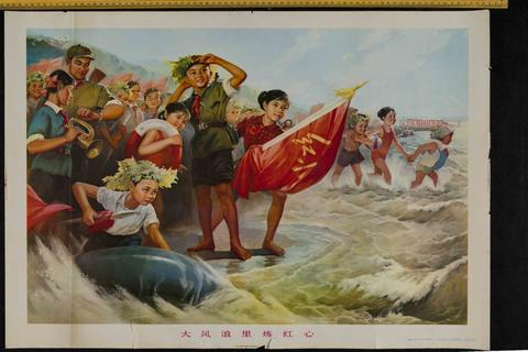 Huge group of school children charge into surging waves. Many wearing camouflage, some holding buoyancy rings, rafts and red flags.