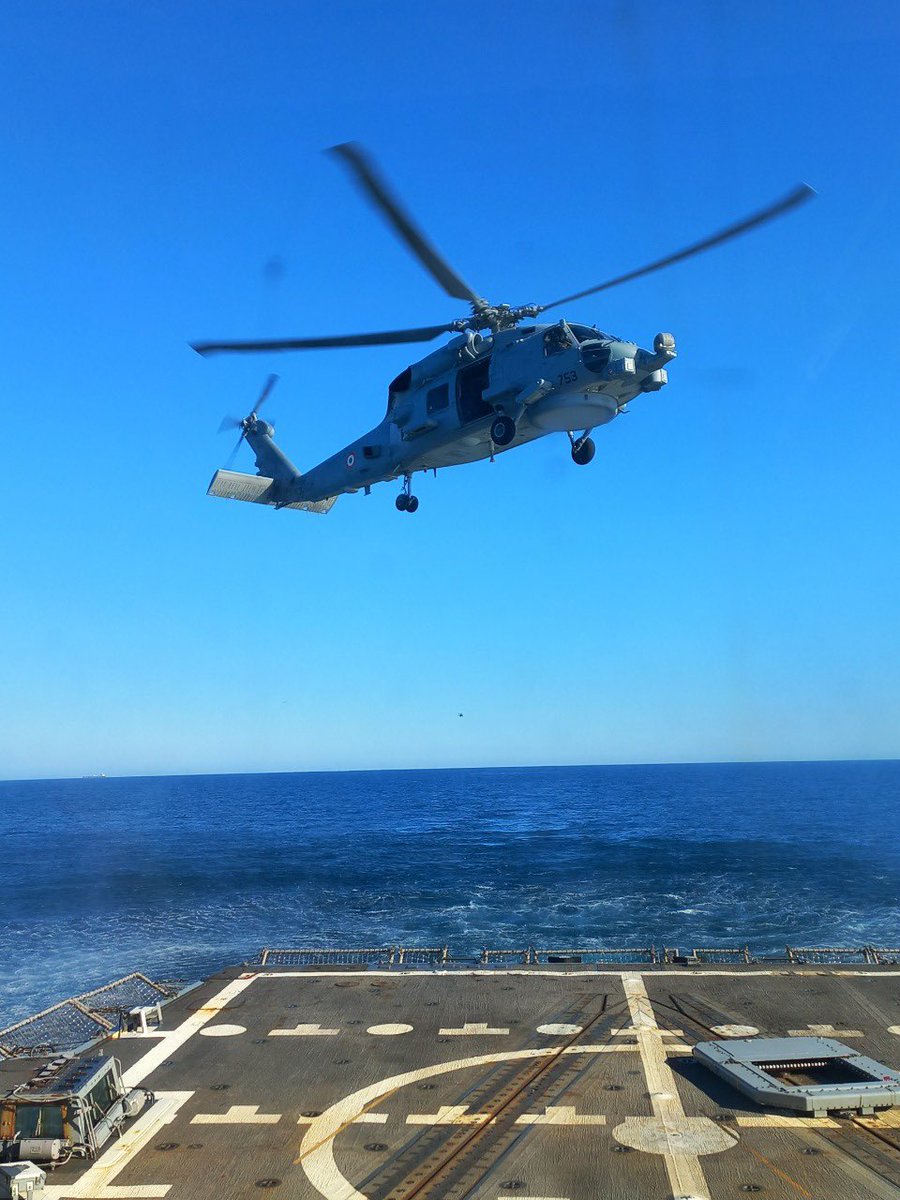 livefist's tweet photo. Great shots just in of the @IndianNavy’s first MH-60 Romeos with their inaugural crew during flights with the Helicopter Maritime Strike Squadron–41 (HSM 41), including day and night deck landing qualifications onboard a @USNavy destroyer. https://t.co/T5AOvNLQXn