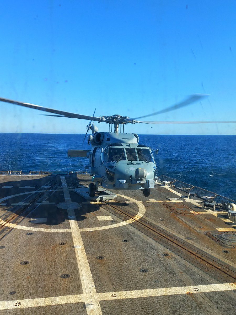 livefist's tweet photo. Great shots just in of the @IndianNavy’s first MH-60 Romeos with their inaugural crew during flights with the Helicopter Maritime Strike Squadron–41 (HSM 41), including day and night deck landing qualifications onboard a @USNavy destroyer. https://t.co/T5AOvNLQXn