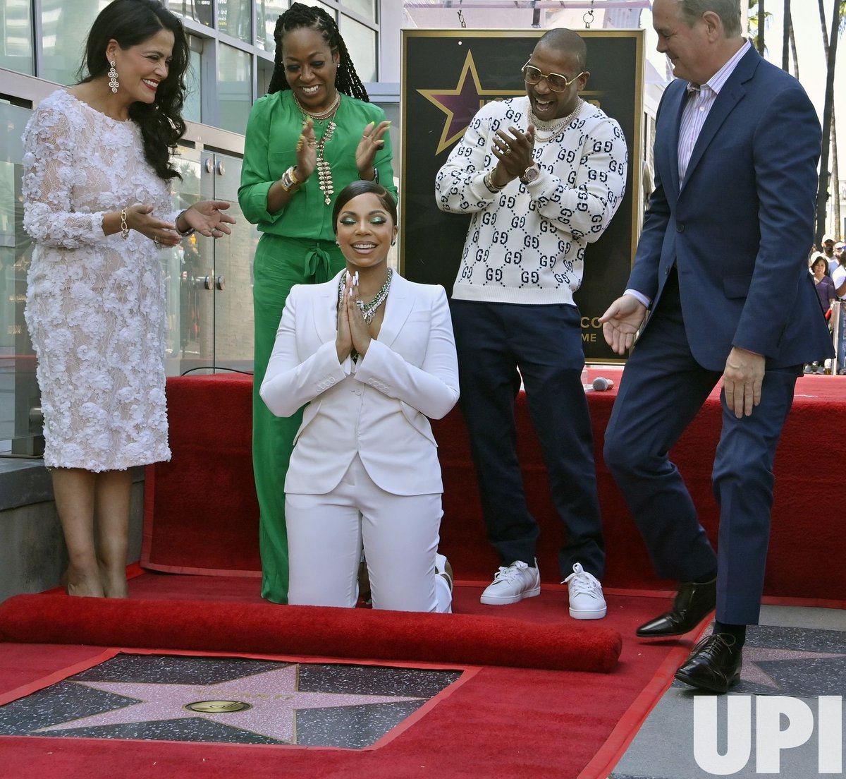 American Grammy Awards-winning singer, actress, author and producer @Ashanti stands atop her star during an unveiling ceremony honoring her with the 2,718th star on the Hollywood Walk of Fame on Thursday, April 7, 2022 in Los Angeles. Photos by Jim Ruymen/UPI