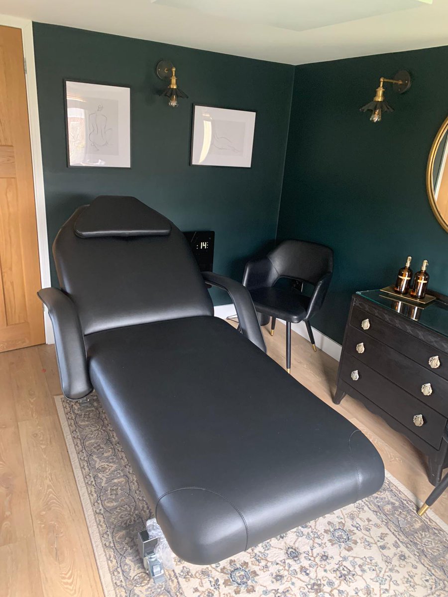 Multi-flex 2 Harley fitted with side arms, in black. The image of elegance and luxury against this bold forest green room.  #British #Avalon #electric #harley