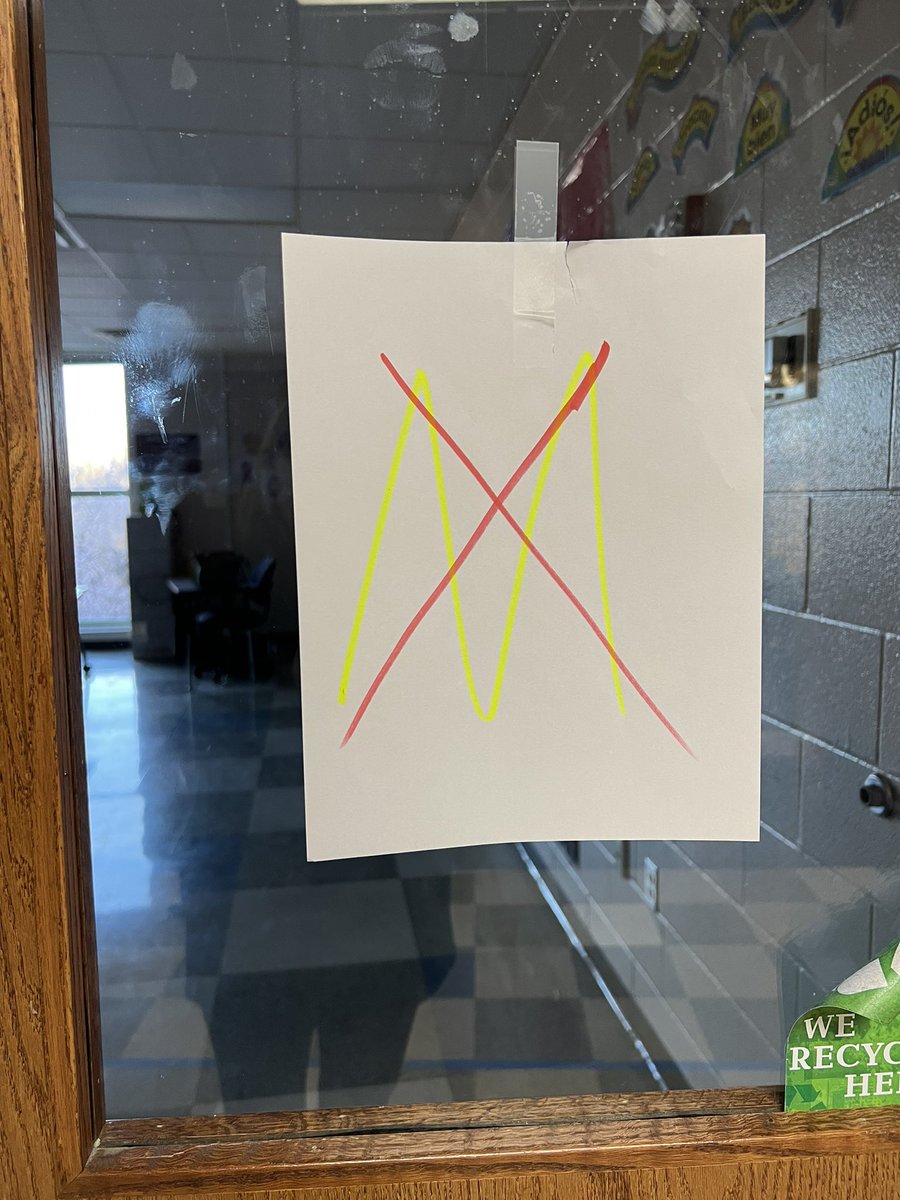 janna_frank's tweet photo. When you live and teach in Ohio and your 8th grade home room draws Michigan for annual college door decorating contest….. #rivalryrunsdeep #What’sABuckeye? 🤣 https://t.co/oNEjkZ2xp4
