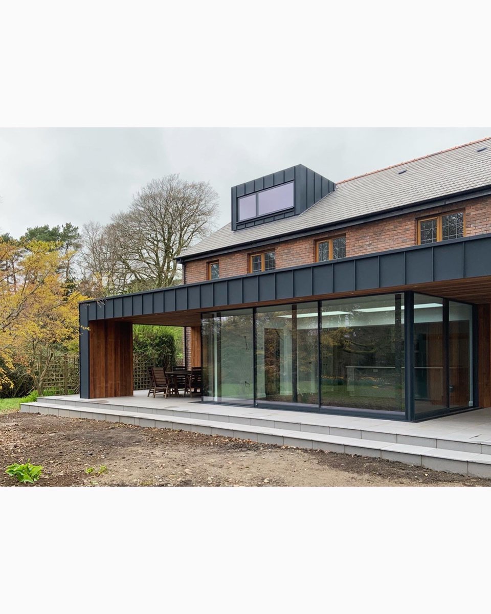 Thrilled to reach Practical Completion on this extension on the edge of the Beacons. Conceived as a pavilion in the trees, it opens out onto flanking terraces, creating a play between indoor outdoor beneath a zinc and cedar canopy #architecture <a href="/smashleydavies/">Ashley Davies</a> <a href="/Fineline_al/">Fineline Aluminium</a>