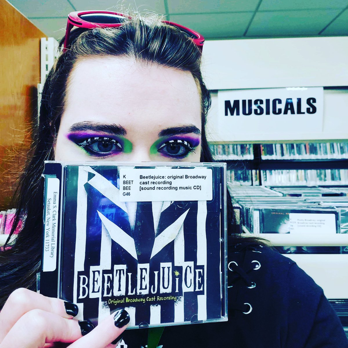 Escml's tweet photo. In honor of #OpeningNight for #BeetlejuiceBway, Emily our Teen Services Librarian has taken a “shelfie” w/ her #staffpick - the original Broadway cast recording of the show! 🎭 💚🖤
@BeetlejuiceBway
#beetlejuicebeetlejuicebeetlejuice #LibraryShelfie #LibraryShenanigans https://t.co/dESBlQwvT2