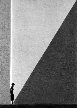 Did you know that Fan Ho added the diagonal shadow in the darkroom?

Yet this is his most famous piece...