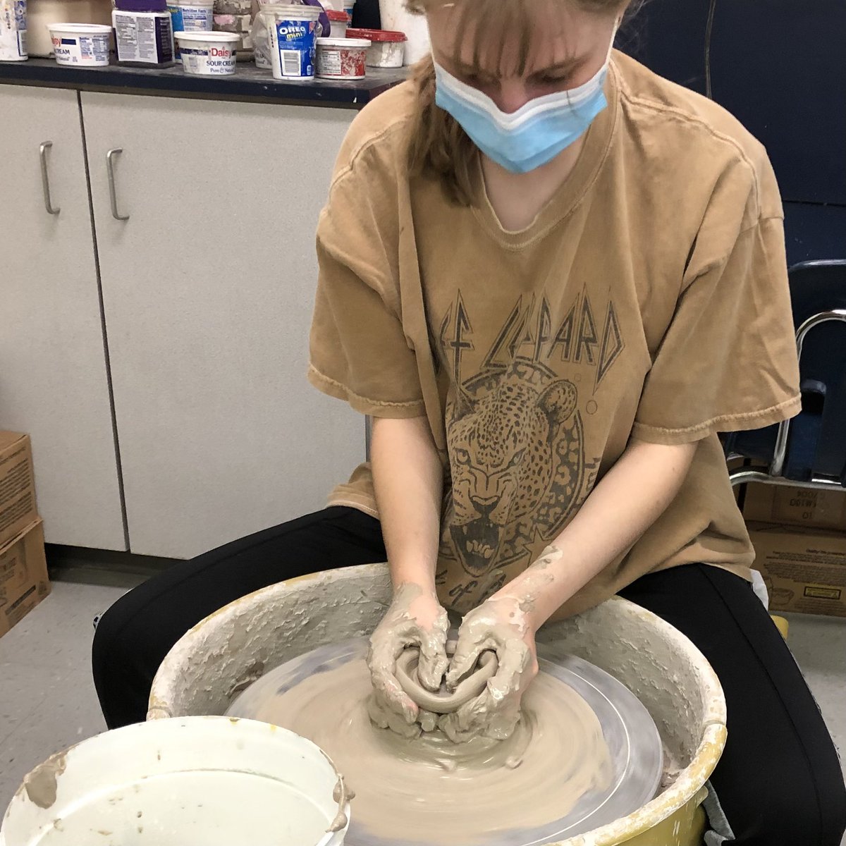 Centering a heap of clay on the potter’s wheel is not easy but students are very fortunate to have that opportunity in Dr. Rutledge’s Ceramics 1 class! Here’s a great shot of Megan M. getting the experience of opening and shaping clay.