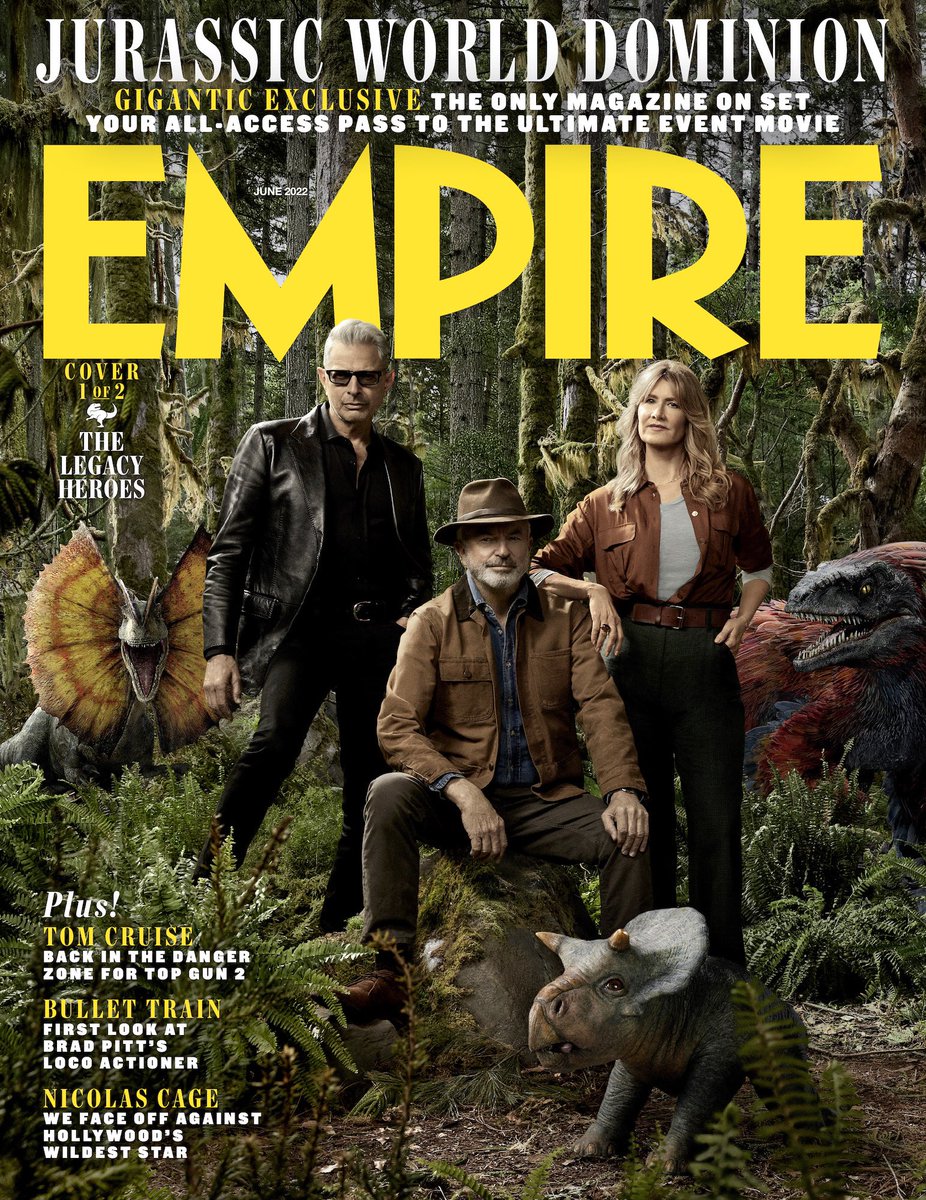 From left to right, the legendary cast of Jurassic Park Jeff Goldblum, Sam Neill, and Laura Dern either sit or stand in a forest of dinosaurs while giving even more badass looks to camera