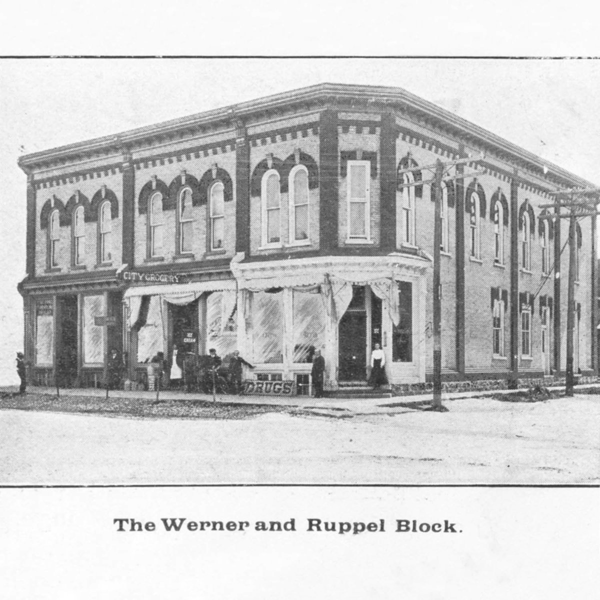 This building (now Sip &amp; Bite) was built by Charles Ruppel in 1892 where he had a furniture and undertaking business in the north end until 1904. It later became the C. D. “Charles” Miller Block.
From the booklet, "Enterprising Elmira Souvenir 1903".
Photo credit: <a href="/MarionRoes/">Marion Roes</a>
