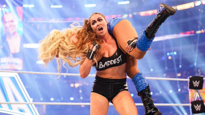 Ronda Rousey and Charlotte Flair at WrestleMania 38