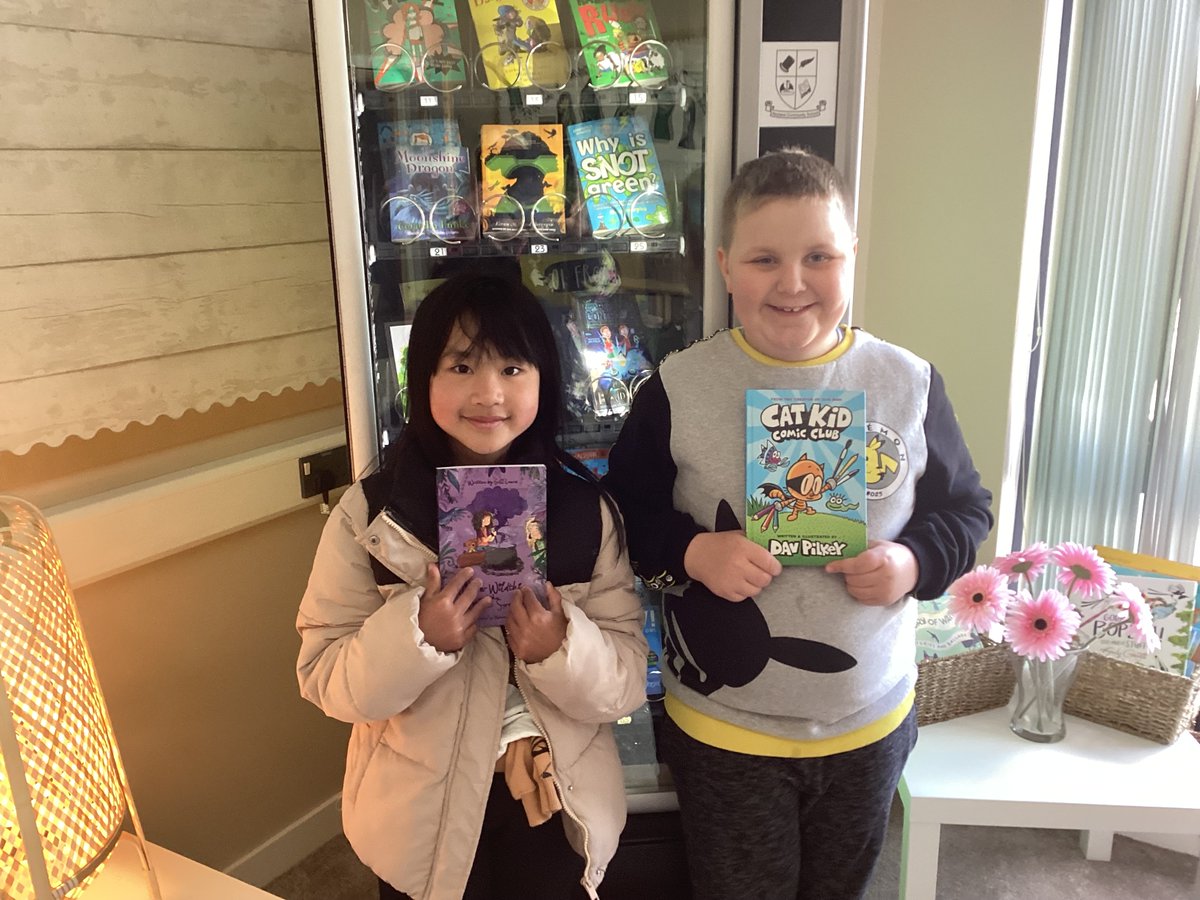 Our young learners enjoying using our book vending machine to choose a book to keep 📖📖❤️