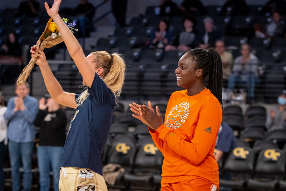CanesWBB's tweet photo. It's more than just a game, basketball is a FAMILY 🏀

@MaevaDjaldi stepped in and walked with former teammate, fellow international player Digna Strautmane during her senior day recognition this year! https://t.co/XSj7GDF6Pg