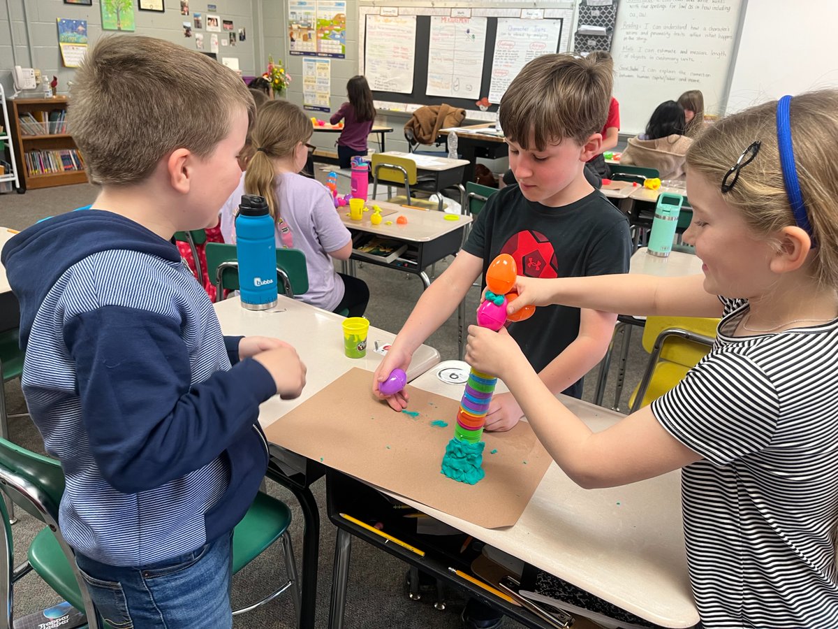 hescubcats's tweet photo. First graders in Mrs. Wilson's class and third graders in Mrs. Justus' class worked together during #STEMBuddies this week to engineer egg towers with plastic eggs and #PlayDoh. They had to try to see who could make the tallest, most stable egg tower! https://t.co/MgkPKWQagn