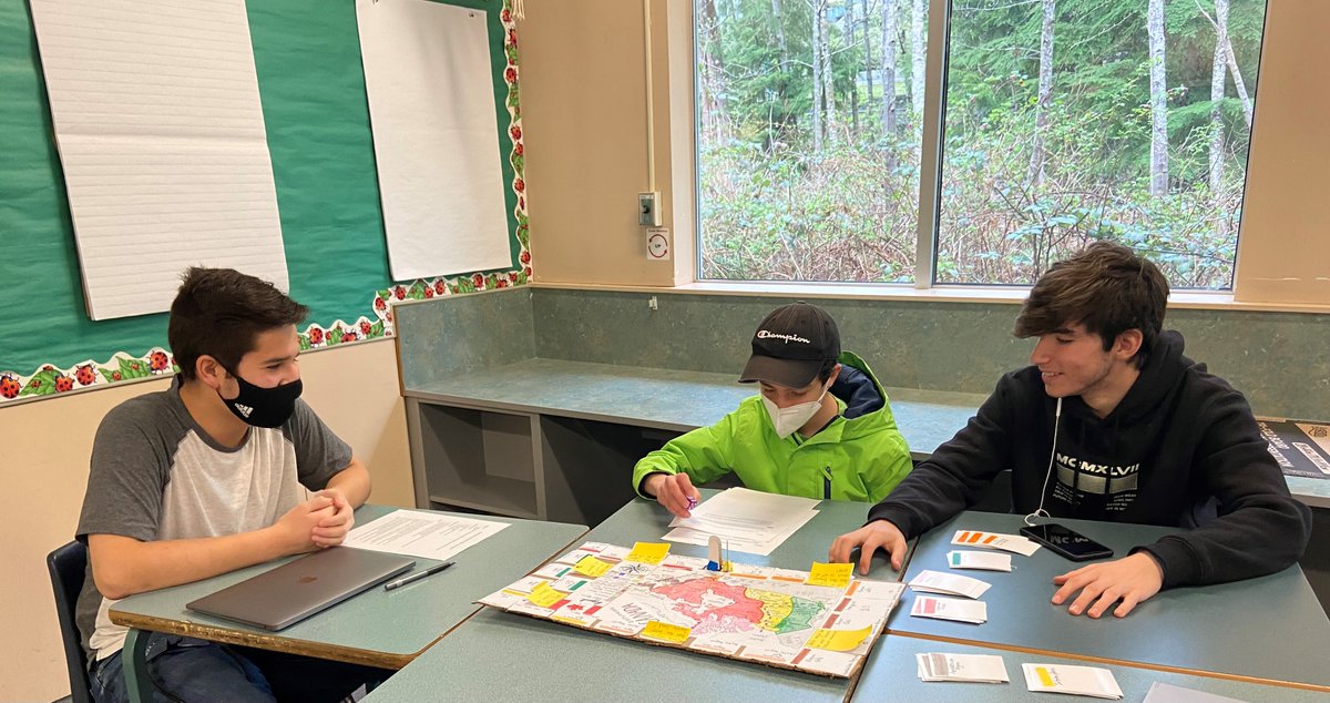 Gleneagle students enjoy a Canadian Geography board game based on the Fur Trade created by fellow students: Chloe, Betty, Noah and Rachel from the class.