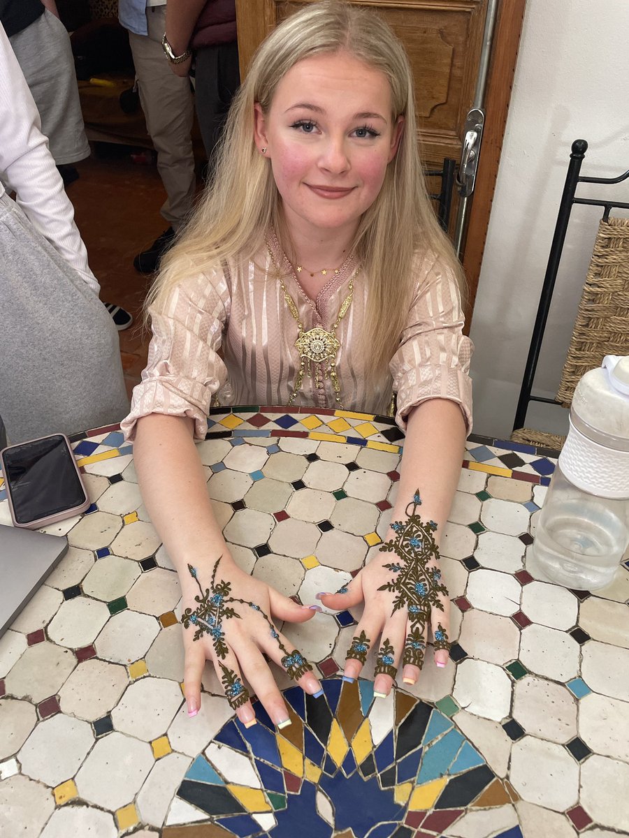 HyaMfl's tweet photo. Morocco Trip Day 12 continued - followed by henna! We learned all about Moroccan traditions surrounding henna and then a local henna artist (a parent of one of our students weβve met) brought our chosen designs to life! #TeamHYA #TuringScheme #EducationWithCharacter https://t.co/ZbTMXnKWqx