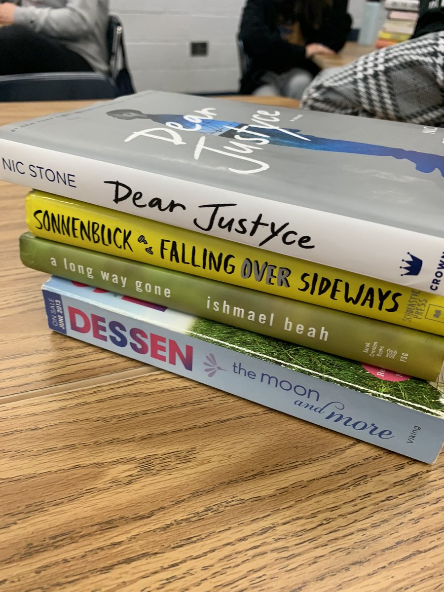 RussoReads's tweet photo. It’s National Poetry Month! We had some Friday fun playing with words and creating book spine poetry!📚 https://t.co/3Y4bRKxFWv