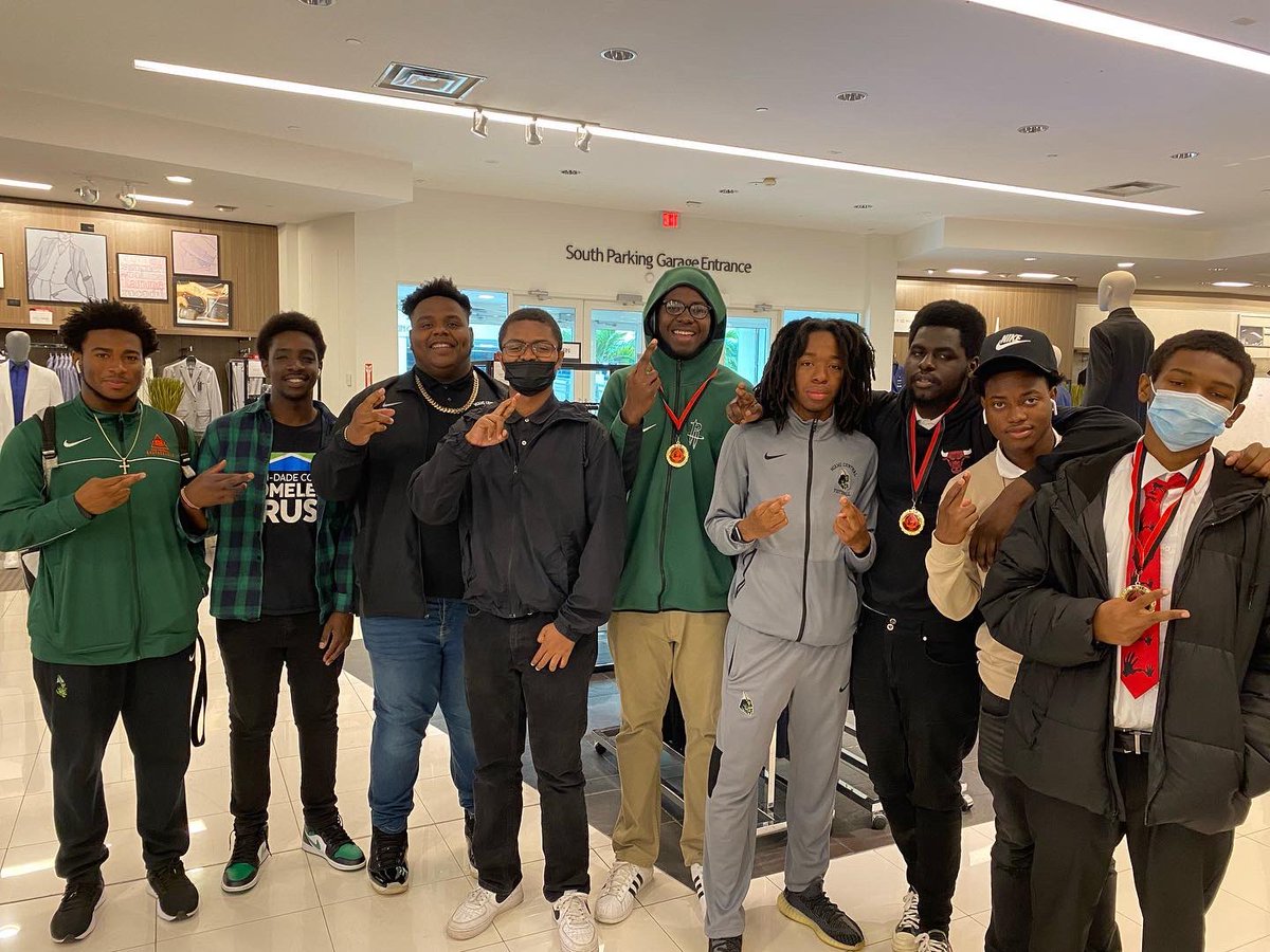 RocketsCentral's tweet photo. Miami Central Senior High School’s Class of 2022 5000 Role Models of Excellence Project - Wilson Scholars and HBCU Scholarship recipients at Macy’s in Aventura Mall get fitted for their designer suits. #RocketPride 🚀💚🤍🚀 #CollegeBound #5000rolemodelsofexcellence https://t.co/NHDbvD9H4j