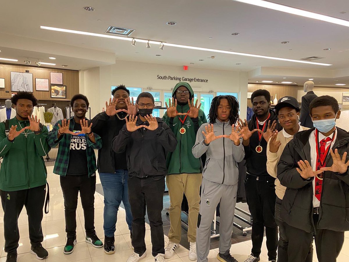 RocketsCentral's tweet photo. Miami Central Senior High School’s Class of 2022 5000 Role Models of Excellence Project - Wilson Scholars and HBCU Scholarship recipients at Macy’s in Aventura Mall get fitted for their designer suits. #RocketPride 🚀💚🤍🚀 #CollegeBound #5000rolemodelsofexcellence https://t.co/NHDbvD9H4j