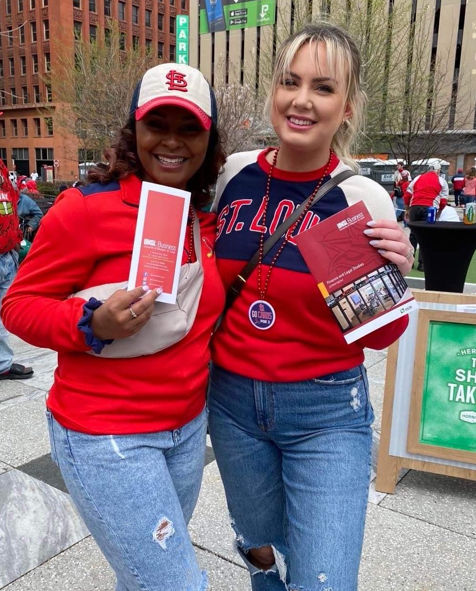 UMSLBUSINESS's tweet photo. The @Cardinals opening day is an unofficial holiday! Our Undergraduate Recruitment Coordinator, Christy, and Marketing &amp; Comms. Coordinator, Eboni, had a great time connecting with future Tritons and retiree Tom Lange. Eboni snagged an appearance on @FOX2now with @andybankertv ! https://t.co/qSfNWaKq0o