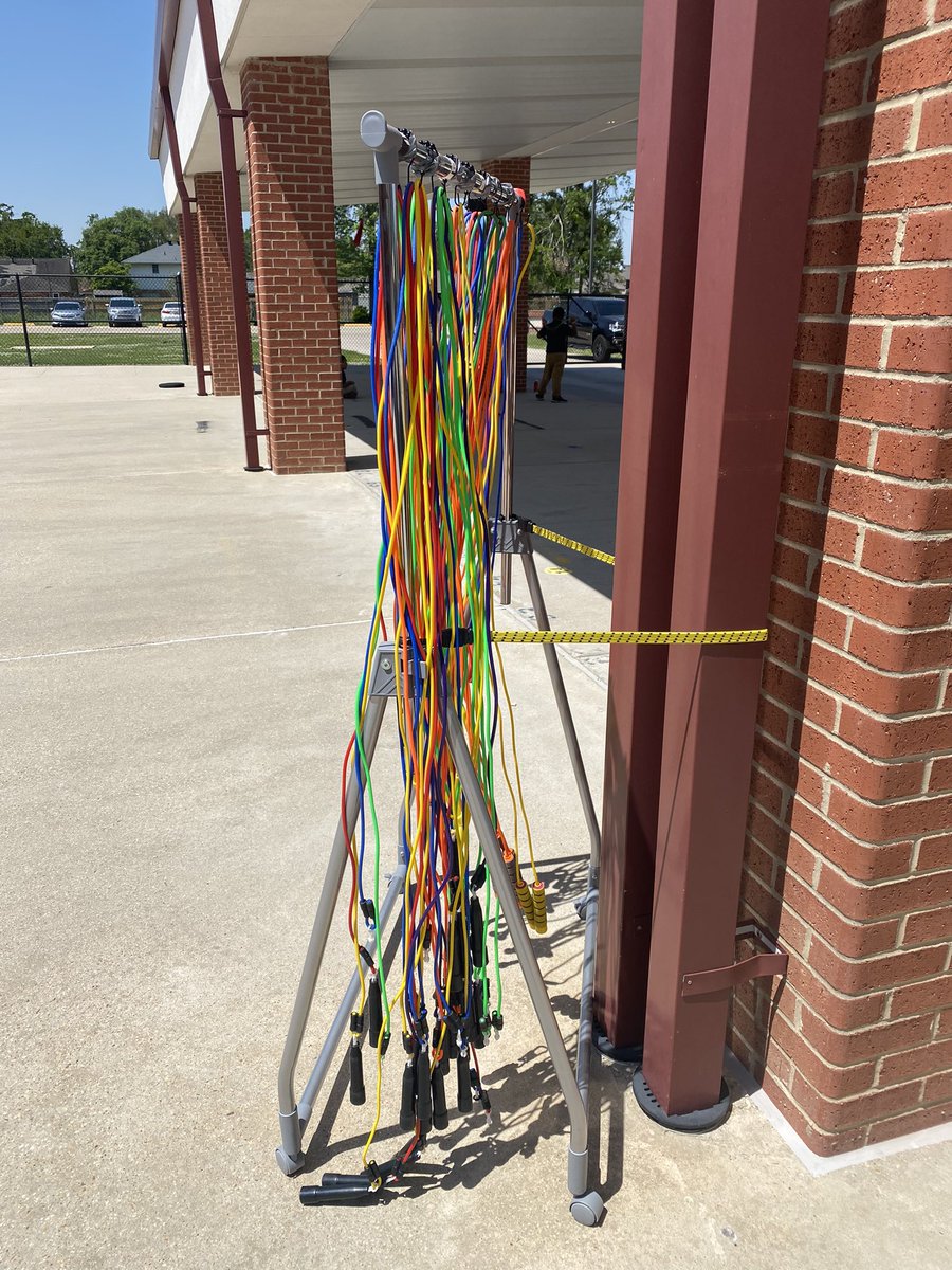 CoachA_physed's tweet photo. The life of a PE teacherโฆhaving to bungee strap my equipment down to keep the wind from taking it/knocking it over. It was a windy day in South Louisiana. Also added a fun wind resistance challenge to jump rope today! #physed #physedrocks https://t.co/cFOrAKbBqQ