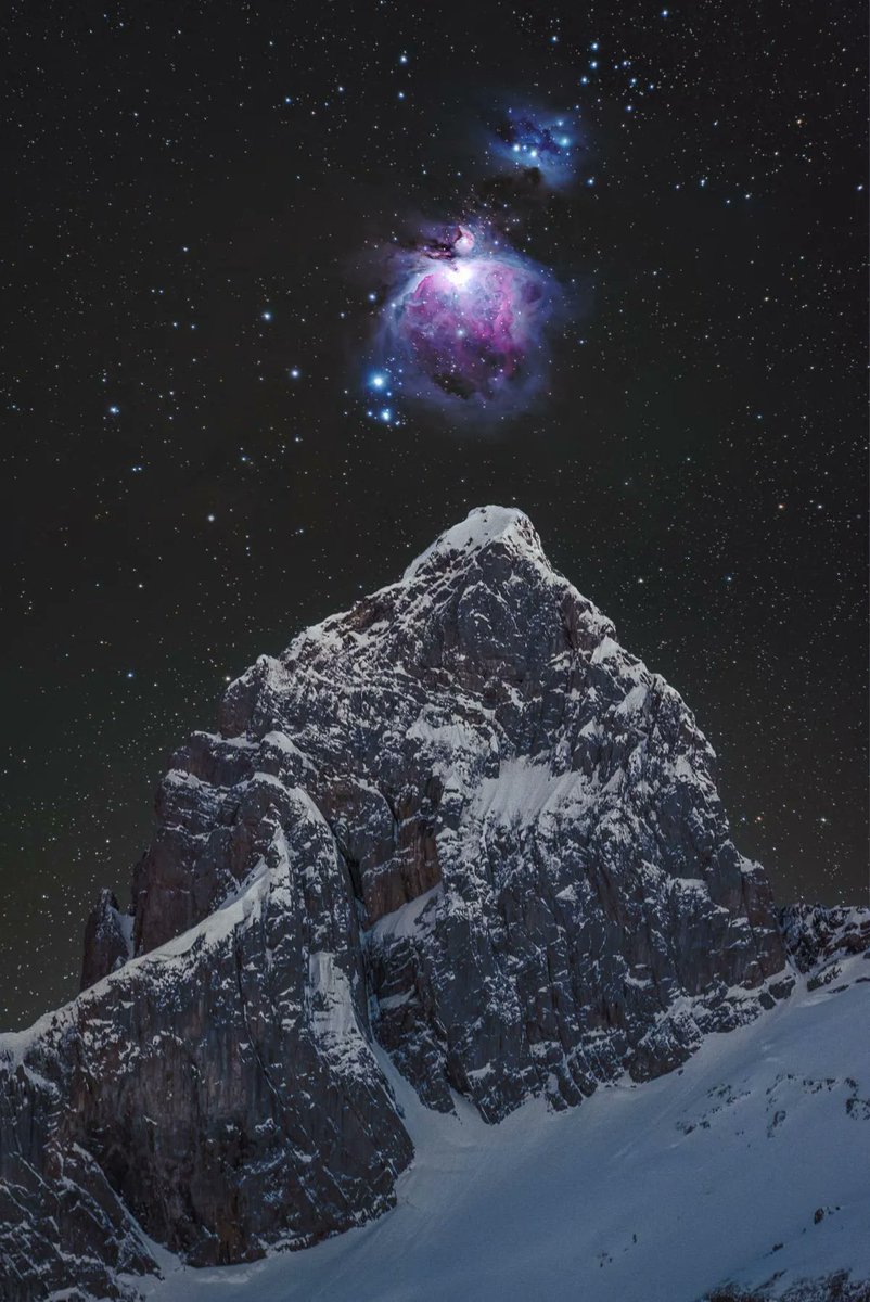 amazing_physics's tweet photo. The Great Orion Nebula above a Mountain in Switzerland https://t.co/hNVDZNr4Zi
