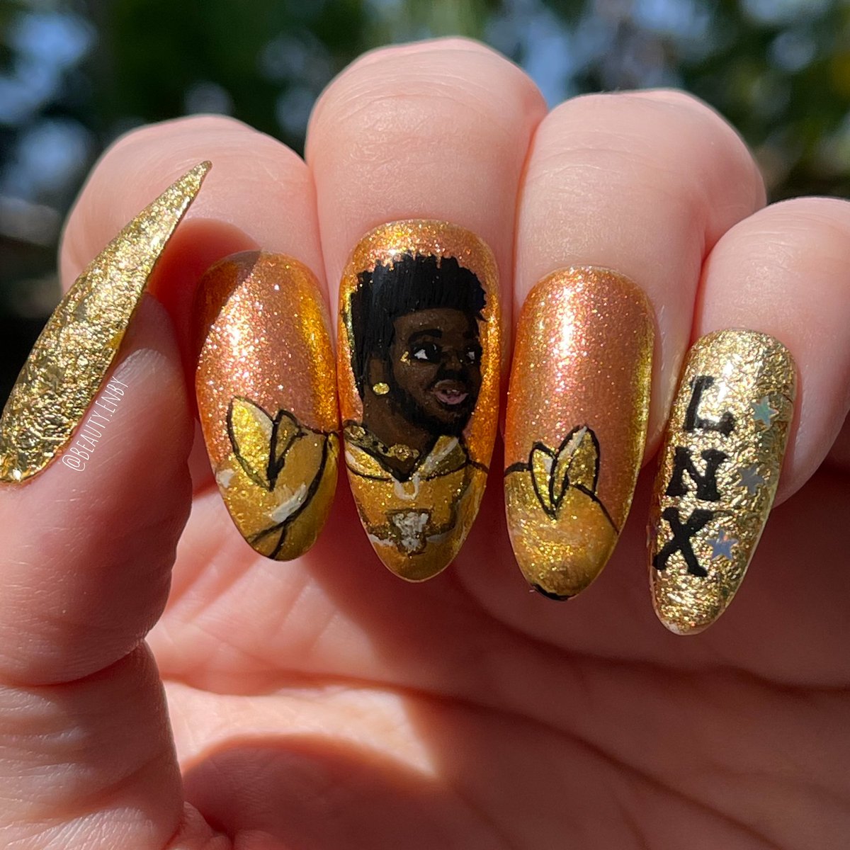 BeautyEnby's tweet photo. .@LilNasX Happy Birthday Montero!! Got some nail artists together on IG to honor you today with manicures inspired by your style and music 🦋💖⚜️ I’m still not over your Met Gala look, obvs✨
#LilNasX #LilNasXNailArt https://t.co/mXn45YHMtJ