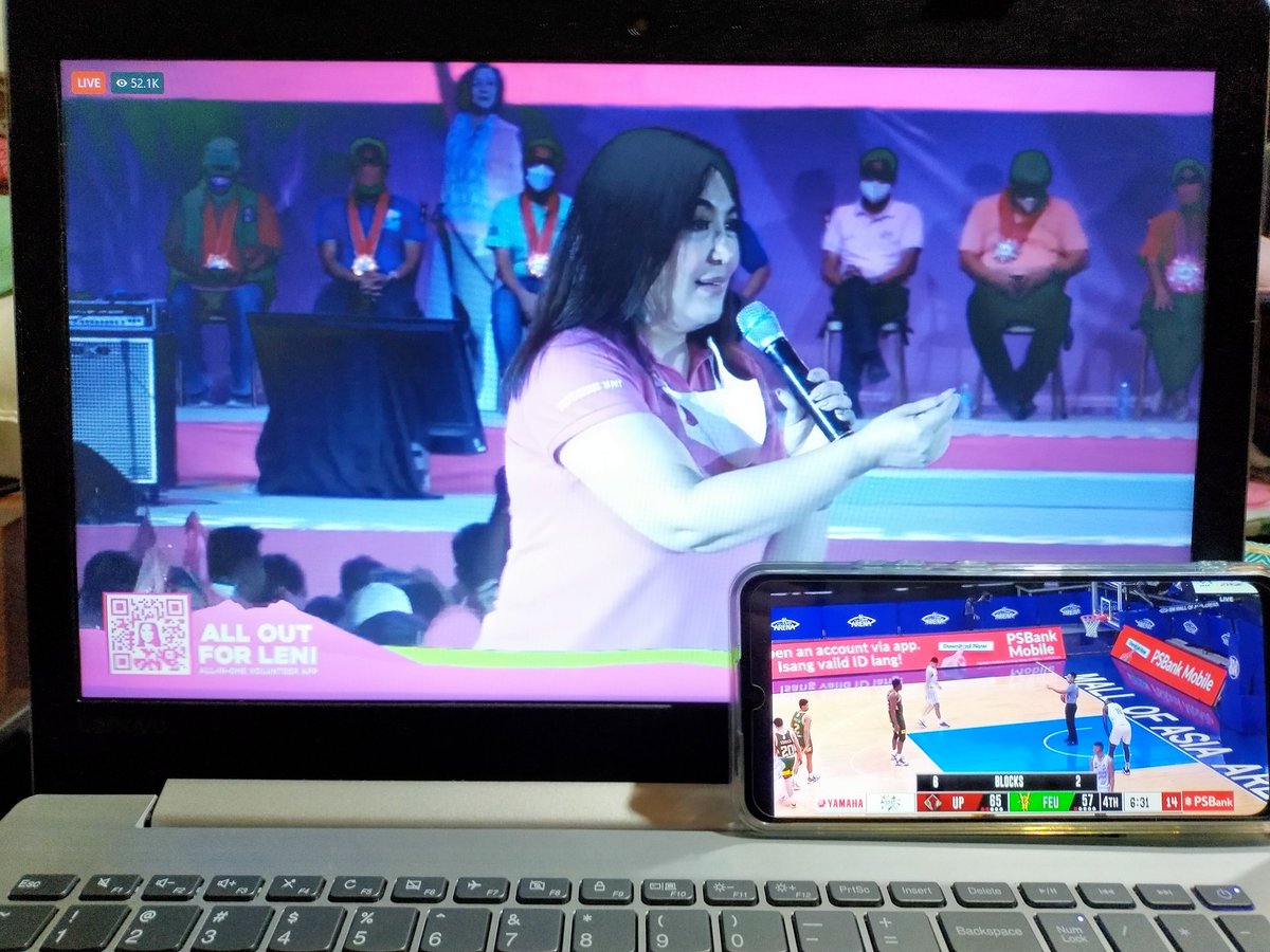 tess_violeta's tweet photo. watching Leni-Kiko Rally and UP vs FEU match at the same time thru livestream. #PampangaIsPink #LeniKikoAllTheWay #GoUPFight https://t.co/2R6givPHN4