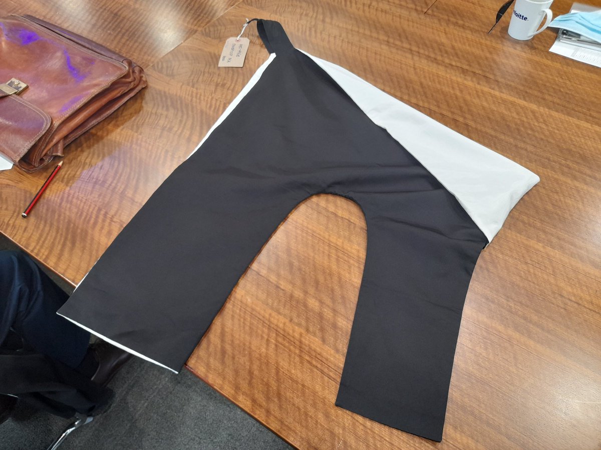 The hood of St Aidan's Theological College, and a Cambridge MA.