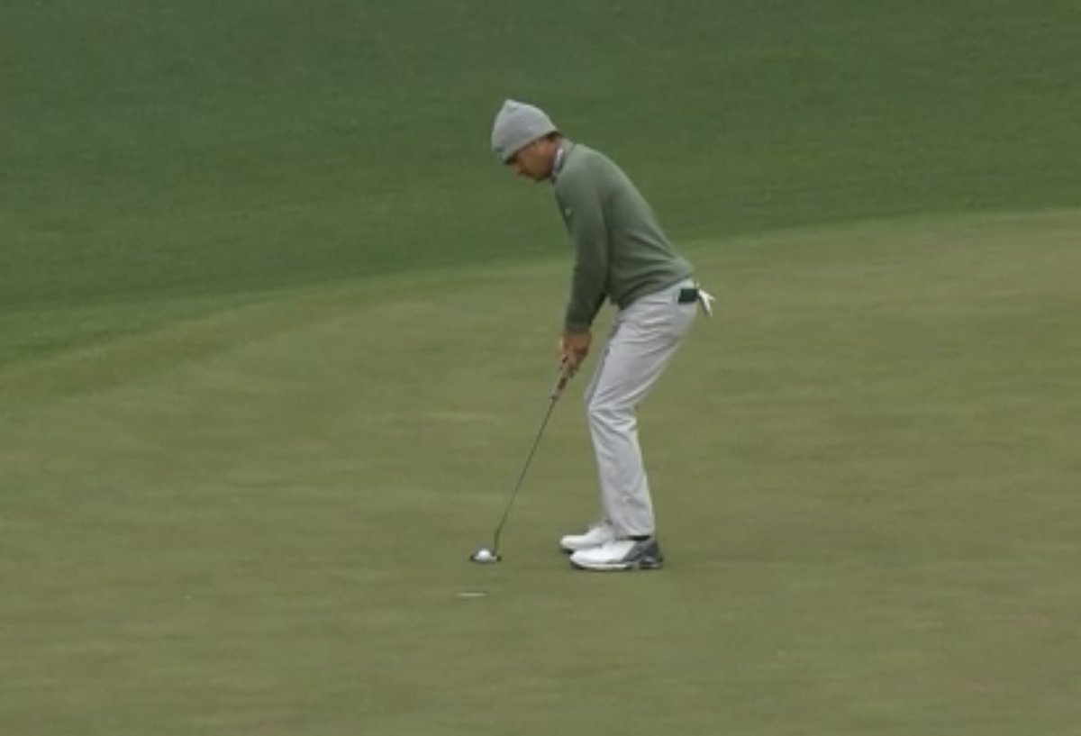 LIVgolf_'s tweet photo. Kevin Kisner wearing a snow cap on a chilly day at Augusta. #TheMasters https://t.co/AUZIoAiX25