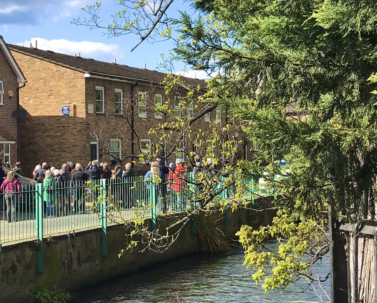 summerstown182's tweet photo. After @Made_in_Merton #WandleWakeUp Procession, beautiful blue skies over sparkling #Wandle waters as Kitz descendants & residents gather to see a historic plaque unveiled in #Merton honouring #FrancisKitz #WilliamMorris #dyer #activist #FrankieGoesToCollywood #KitzInFitz https://t.co/bmyr7vpa4S