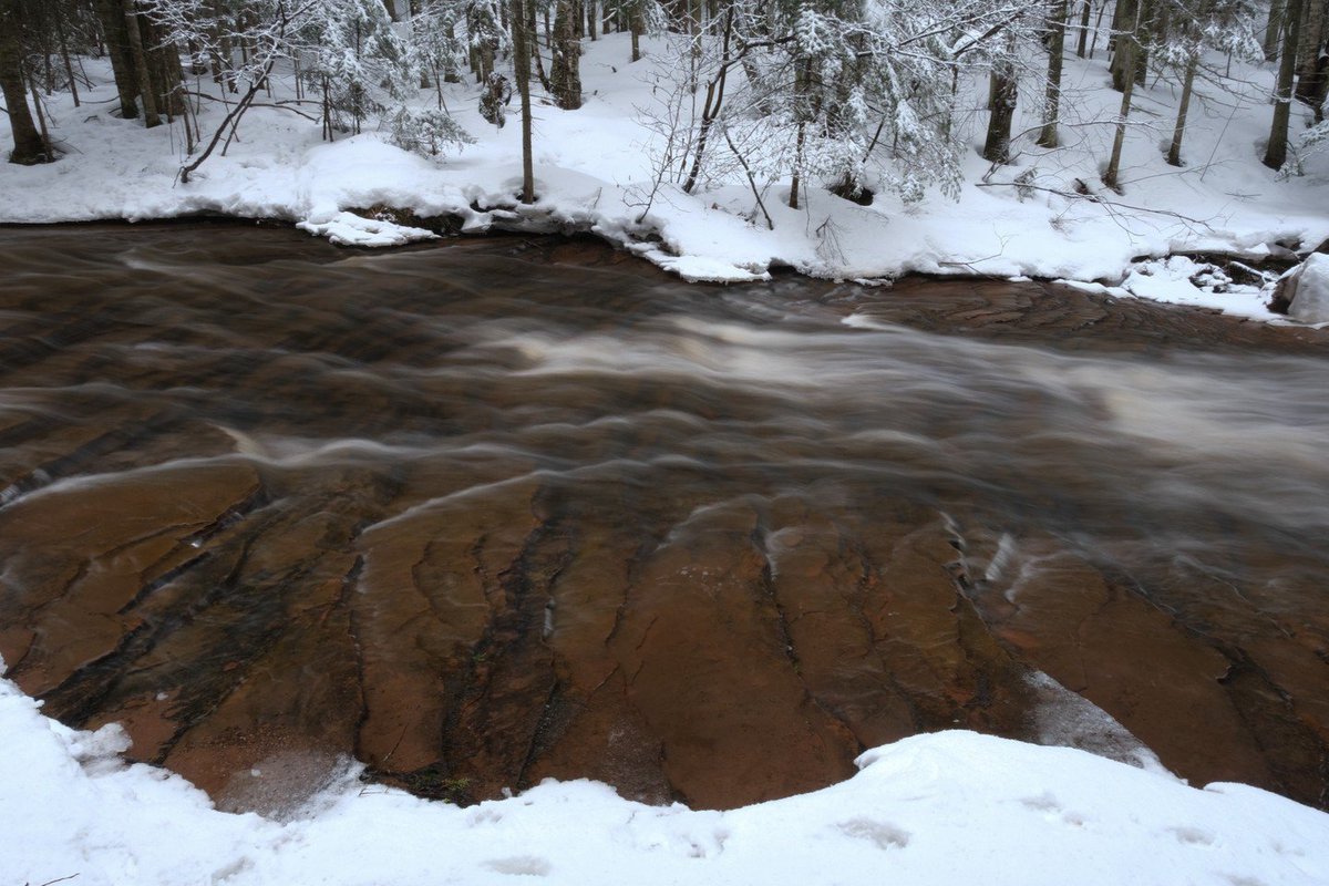 Bayfield_WI's tweet photo. "I'm done with winter, but winter's not done with me."
.
.
. 
Thanks for sharing this photo with us @tumasa! 
Picture taken at Siskiwit Falls in Cornucopia. https://t.co/JrQSwNHewP