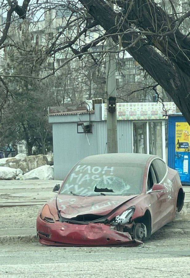 allumino's tweet photo. @elonmusk @jspeedymorris22 @darrenrovell Maybe you should find an owner of this Tesla from Mariupol, Ukraine? Or, at least, reply to those signs by russians on particular Tesla :) https://t.co/ashazADquh