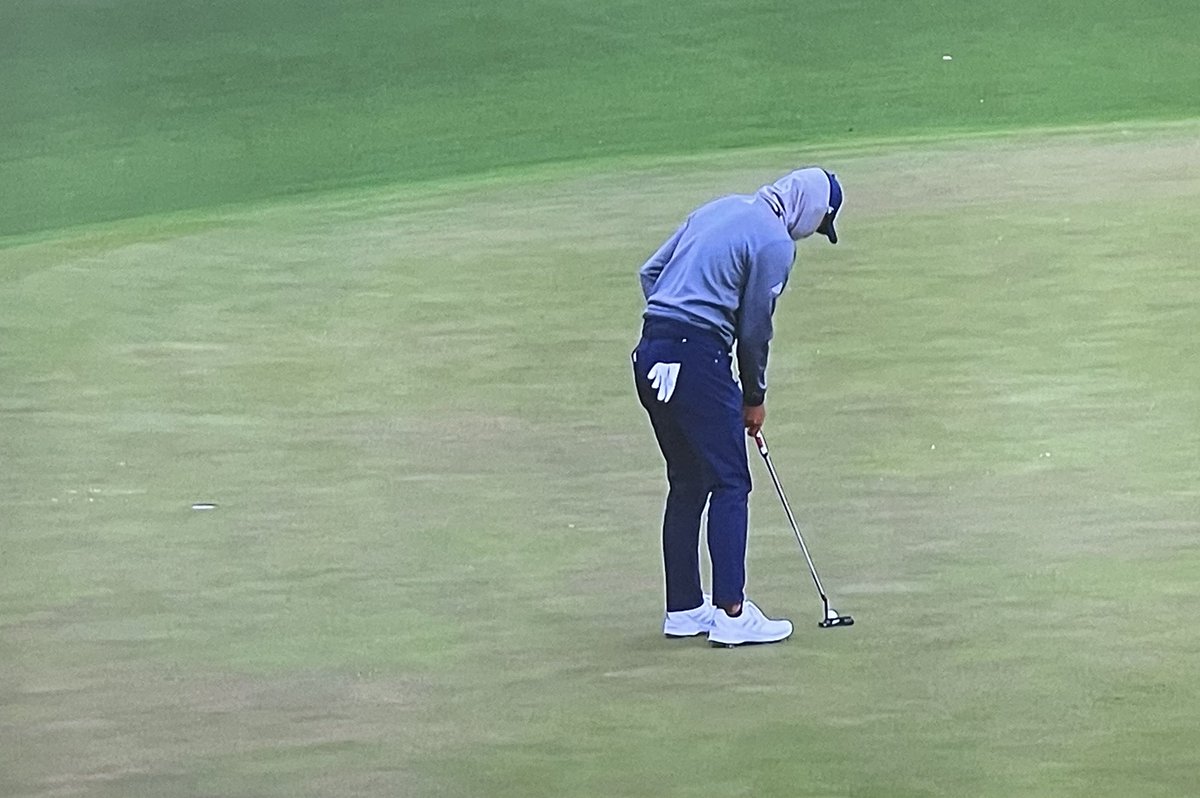 LIVgolf_'s tweet photo. Collin Morikawa, the kid from California, bundled up for today’s third round of #TheMasters. https://t.co/NgEIl3U4MA