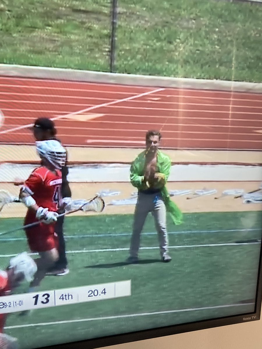 the_post_game's tweet photo. Gotta love the guy on Jacksonville’s bench with the green robe + no shirt combo. 

Is this Jacksonville’s version of the ND bagpipes? https://t.co/dr709t1Ucu