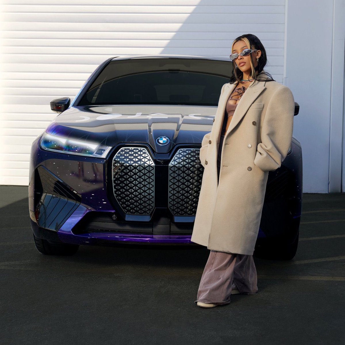 PopBase's tweet photo. Doja Cat stuns for BMW. https://t.co/4OkbmQ2IUi