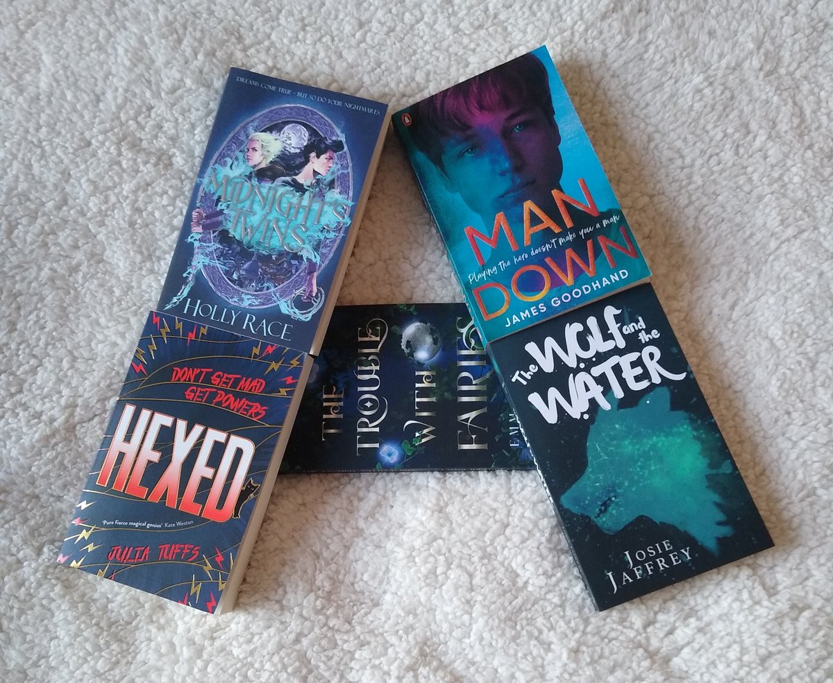 ReaderPenguin_'s tweet photo. Thank you so much to @UKYAbooks for this amazing bundle of #UKYA books I won from their third treasure hunt giveaway as part of the #UKYAPreview. In recognition of how brilliant UKYA is, I decided to arrange the books in the letters 📚 https://t.co/O93S24P4em
