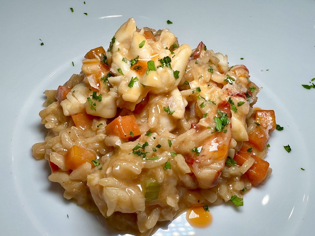 Butter poached lobster 🦞 risotto with mirepoix, mascarpone, and lobster oil.