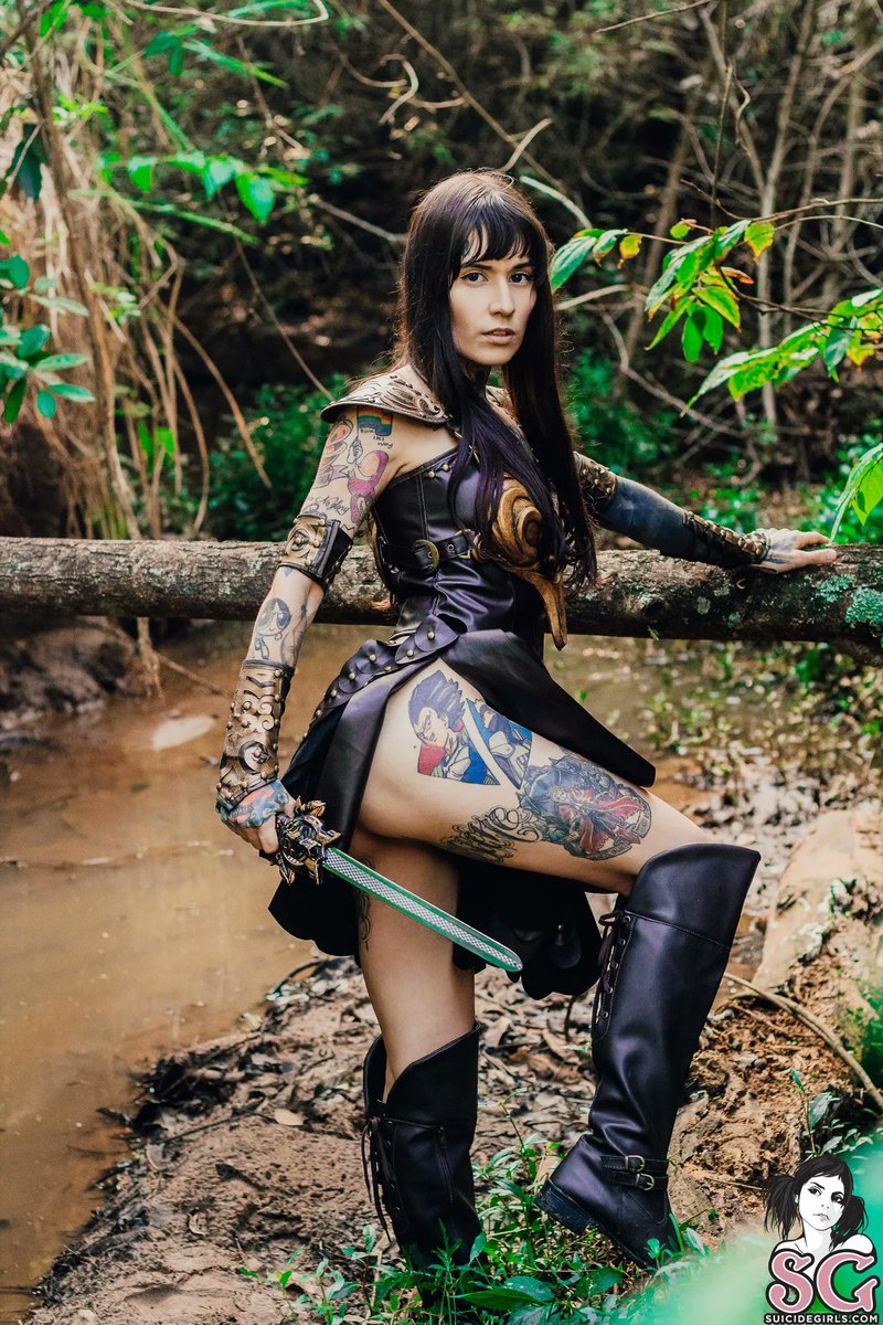 SuicideGirls's tweet photo. I'm just a girl in search of a really good sword. #Gorgeous @pitmagrin is in #MemberReview with "Warrior Princess Back" ⚔️ - https://t.co/YiX2Ily4JB https://t.co/Uzy7fSYS40
