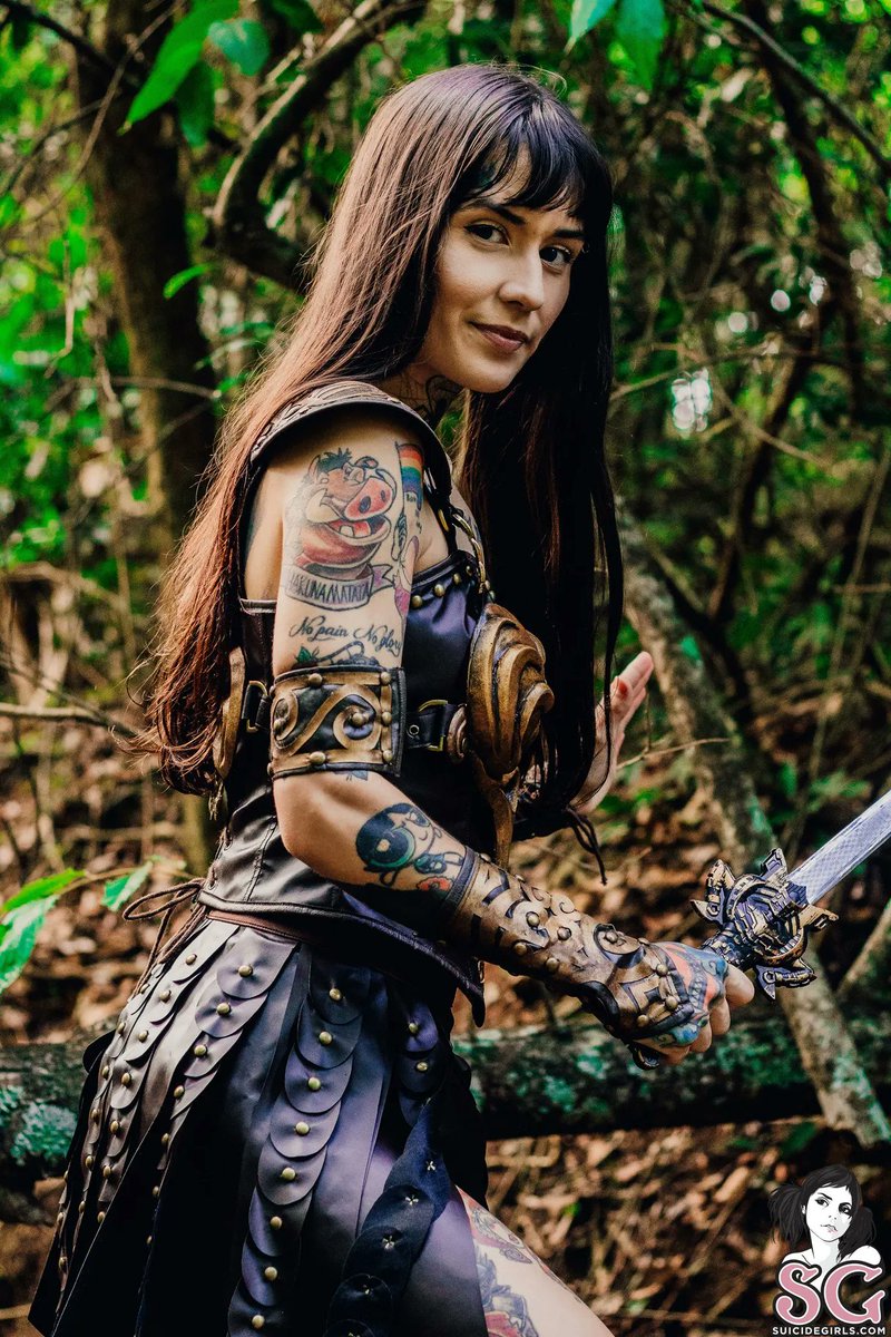 SuicideGirls's tweet photo. I'm just a girl in search of a really good sword. #Gorgeous @pitmagrin is in #MemberReview with "Warrior Princess Back" ⚔️ - https://t.co/YiX2Ily4JB https://t.co/Uzy7fSYS40