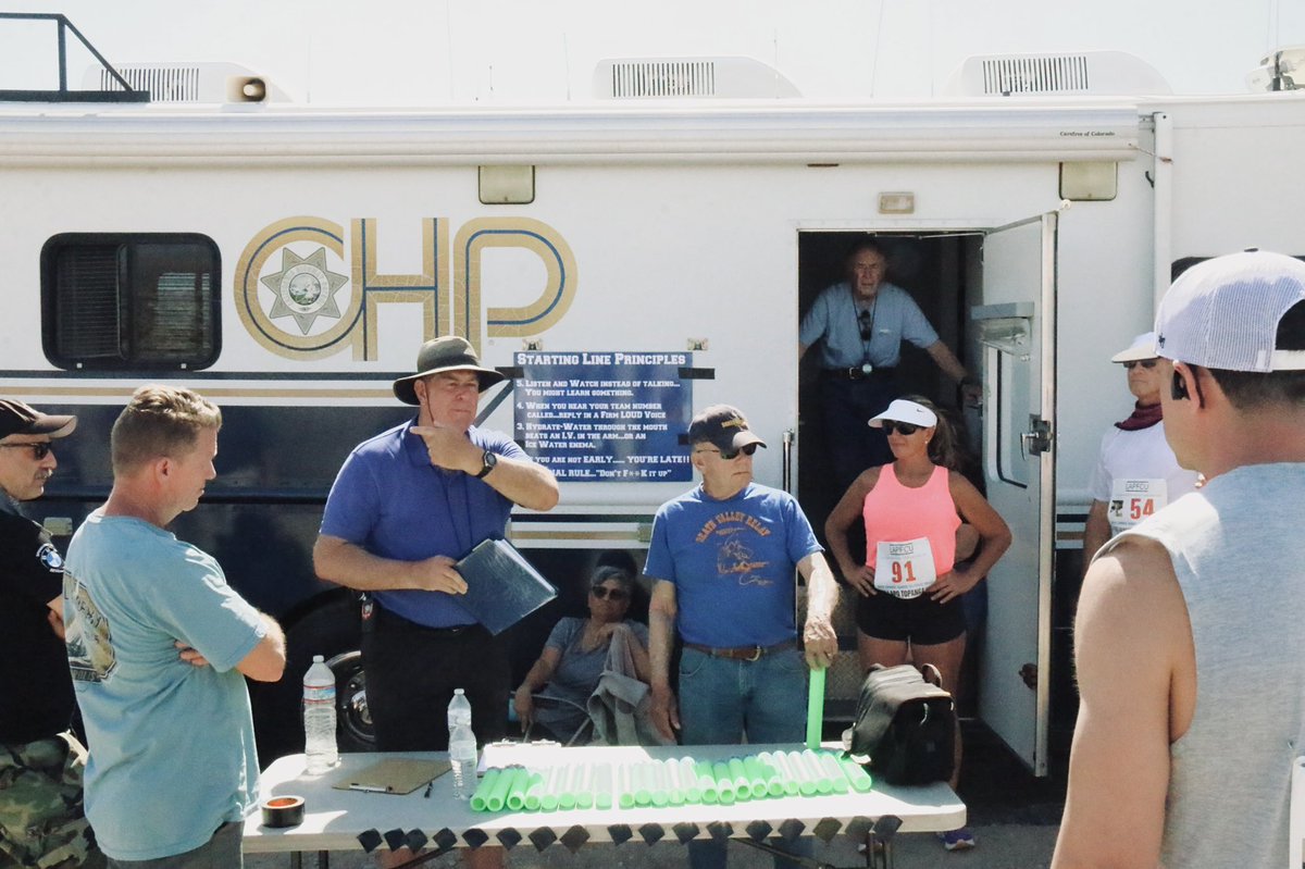 knxpete's tweet photo. #ChallengeCupRelay has 216, 20 person teams of Police Officers from 7 States and Canada running 120 miles from Baker, CA to Las Vegas, NV. Temps 99 degrees, humidity 11%. @knxpete coordinates runners at start line. Racers finish 3-9AM Sunday. @knxnews https://t.co/oFtzyTYR6a