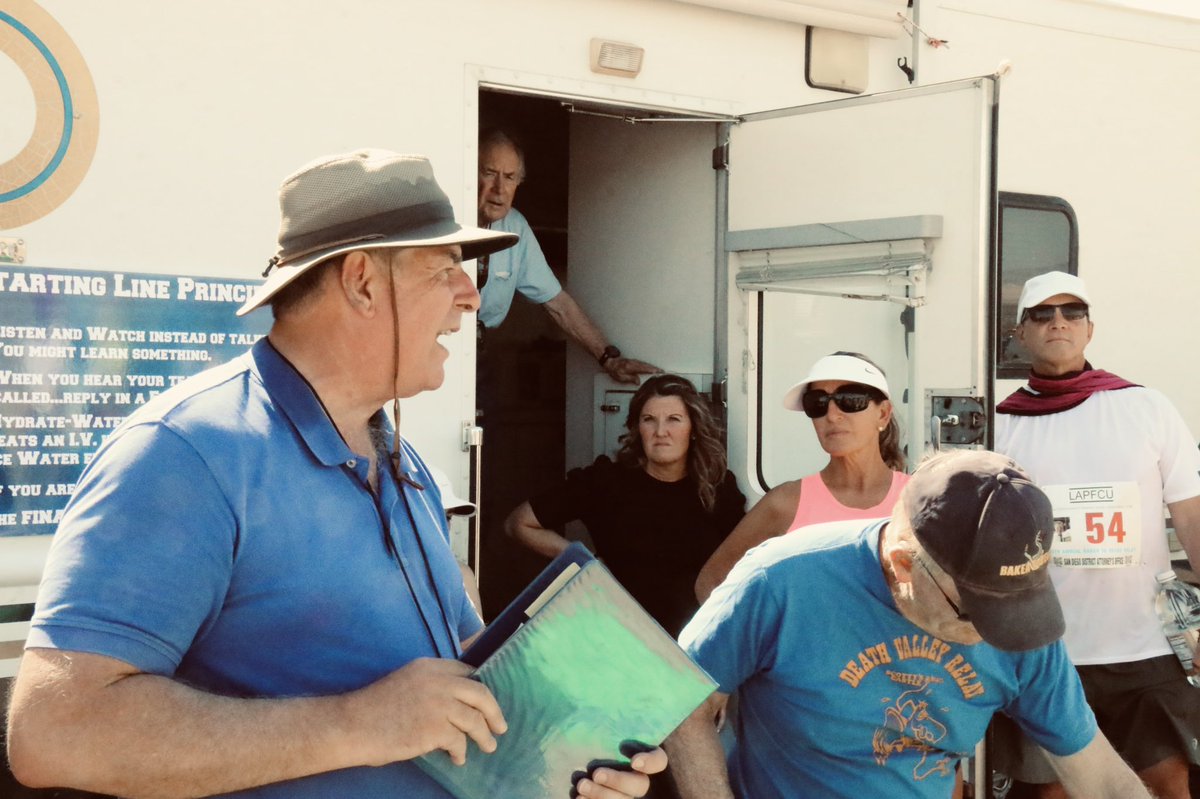 knxpete's tweet photo. #ChallengeCupRelay has 216, 20 person teams of Police Officers from 7 States and Canada running 120 miles from Baker, CA to Las Vegas, NV. Temps 99 degrees, humidity 11%. @knxpete coordinates runners at start line. Racers finish 3-9AM Sunday. @knxnews https://t.co/oFtzyTYR6a