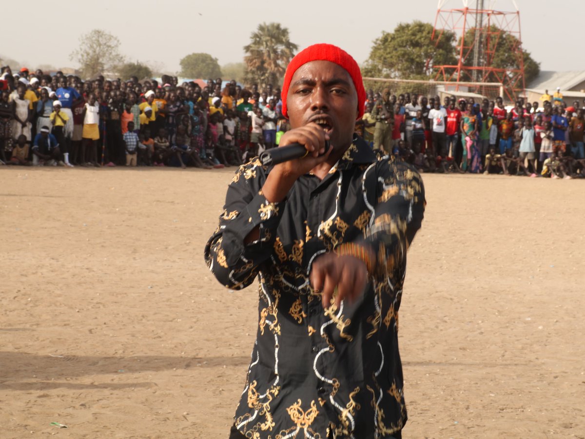 unmissmedia's tweet photo. Cheering crowds. Talented musicians🎵. Dancing💃. A call to #StandUp4Peace 
That's what an #UNMISS peace🕊️ concert in Bor, #SouthSudan🇸🇸 was all about. 
“Peace is what we need — in our hearts, our homes and in our communities,” said Rebecca Ajok, one of the excited attendees. https://t.co/eRJMHYLww8