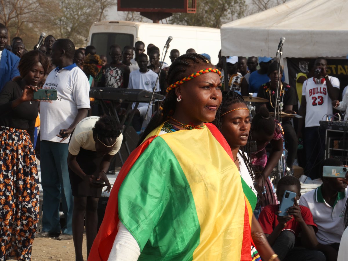 unmissmedia's tweet photo. Cheering crowds. Talented musicians🎵. Dancing💃. A call to #StandUp4Peace 
That's what an #UNMISS peace🕊️ concert in Bor, #SouthSudan🇸🇸 was all about. 
“Peace is what we need — in our hearts, our homes and in our communities,” said Rebecca Ajok, one of the excited attendees. https://t.co/eRJMHYLww8