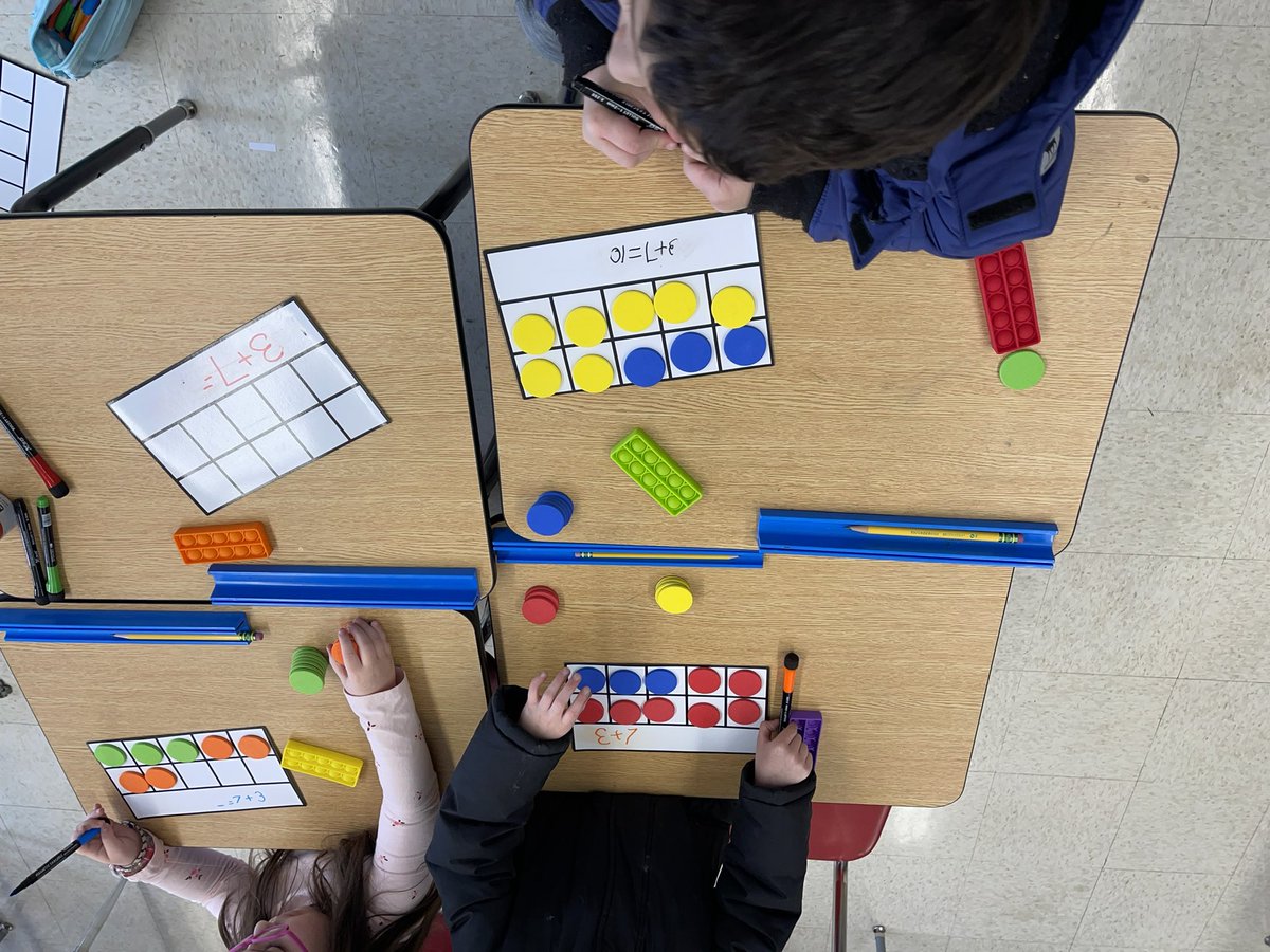 Our 1st graders worked hard yesterday in our after school math lab! Students first did a whole group activity to build number sense then worked in differentiated math centers. One group worked collaboratively on a task while the others worked in a teacher led small group!