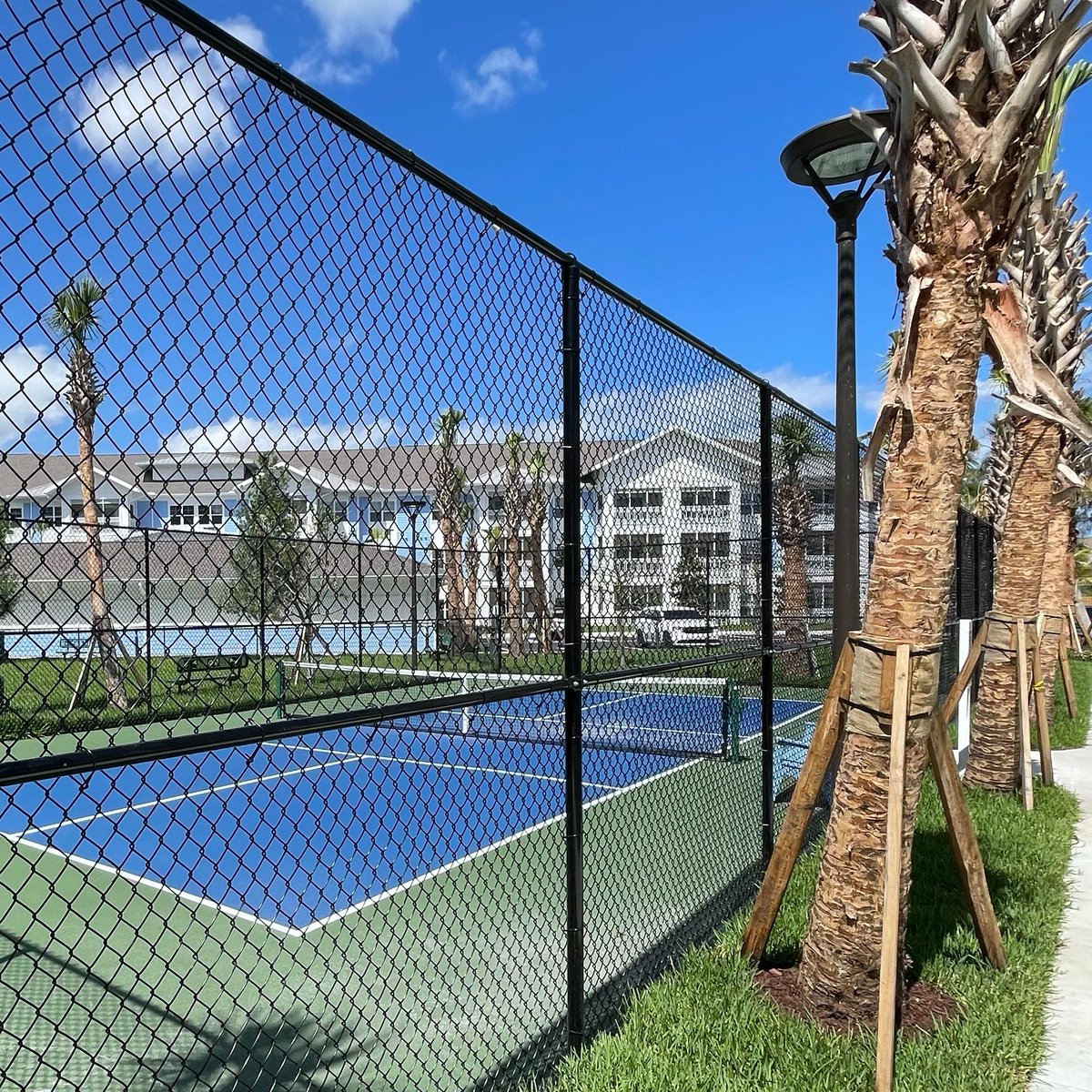 LTGCarlsonFence's tweet photo. #pickleball anyone? Check out our chainlink fence surrounding this court in Stuart, Florida. Who's up for a game?

#florida #fencecompany #miami #fencecontractor
#chainlink #fence #athleticfence #pickleballcourt https://t.co/LnjVm2EO0V