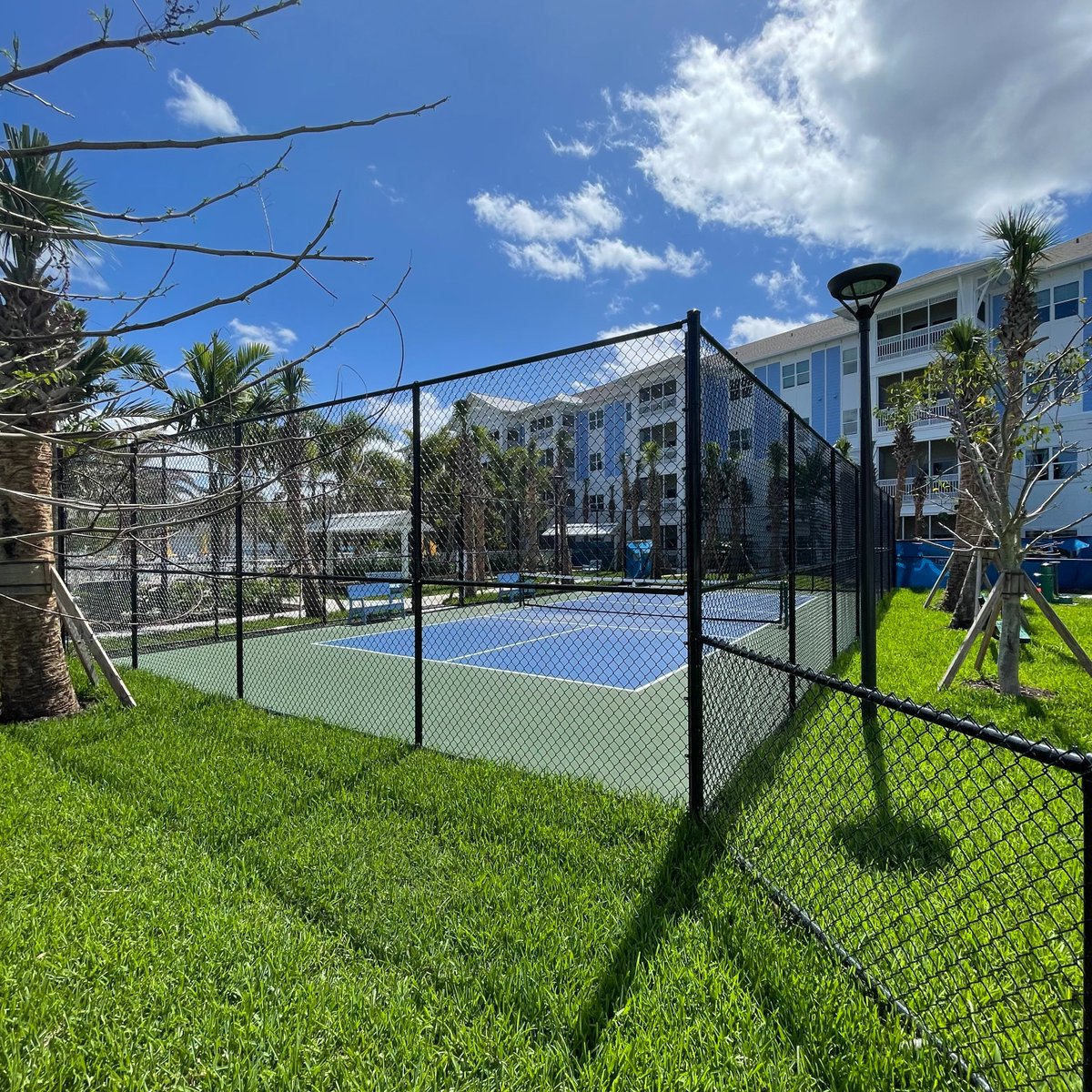 LTGCarlsonFence's tweet photo. #pickleball anyone? Check out our chainlink fence surrounding this court in Stuart, Florida. Who's up for a game?

#florida #fencecompany #miami #fencecontractor
#chainlink #fence #athleticfence #pickleballcourt https://t.co/LnjVm2EO0V