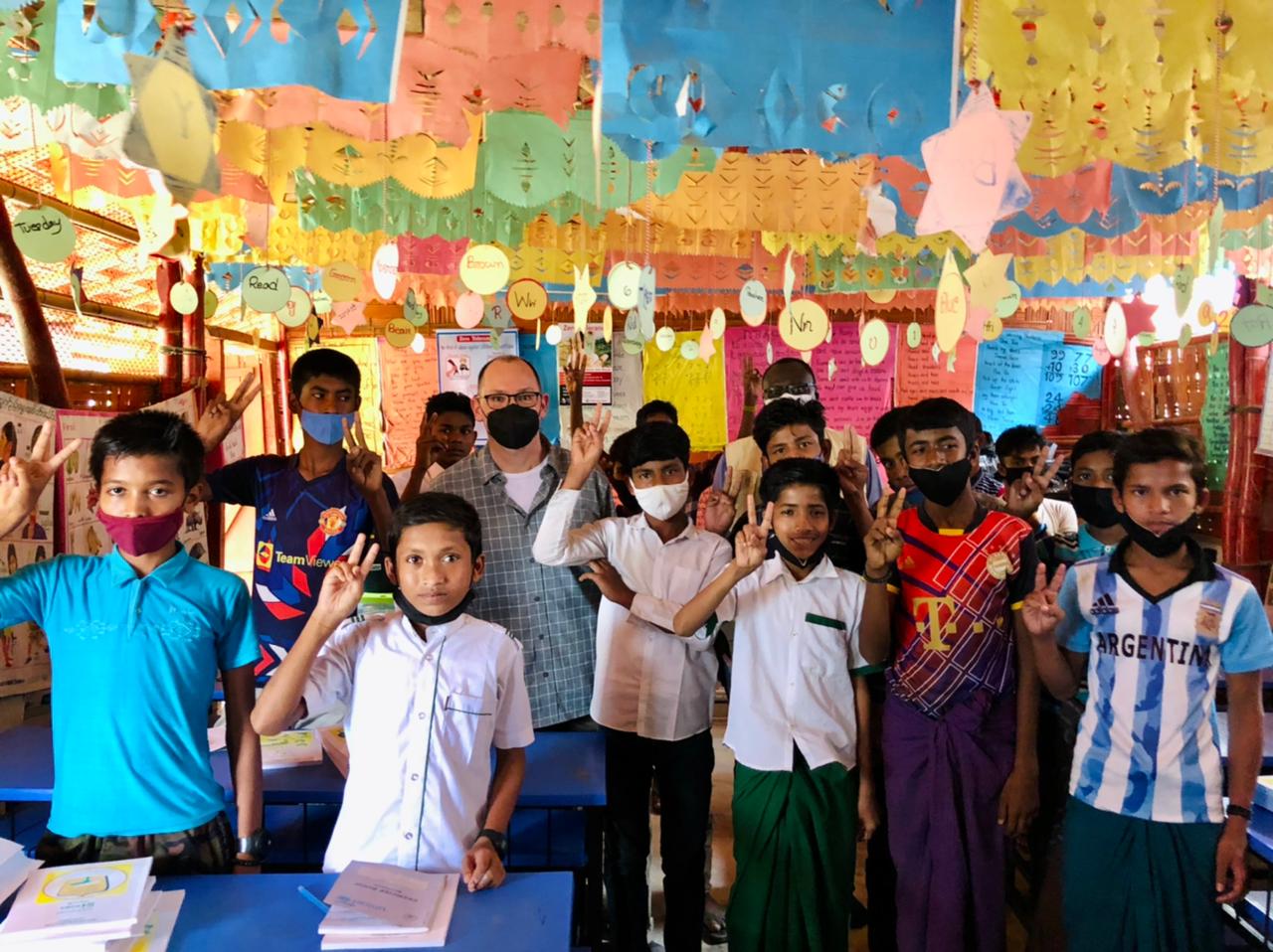 Ambassador Haas along with the Rohingya children in a Learning Center in camp 4.