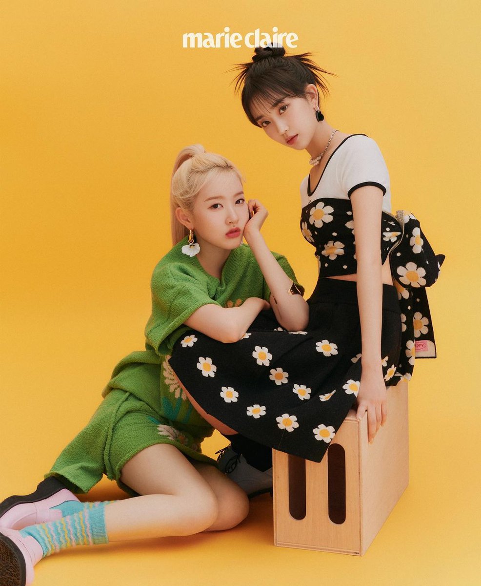 Baezumin's tweet image. Just like daisy that resembles purity and innocence, I, with the fiercy Sieun, being the sophisticated women that we are within a touch of Marie Claire. Better be careful of the gaze, ‘cause we don’t take care after all the hearts that fell.