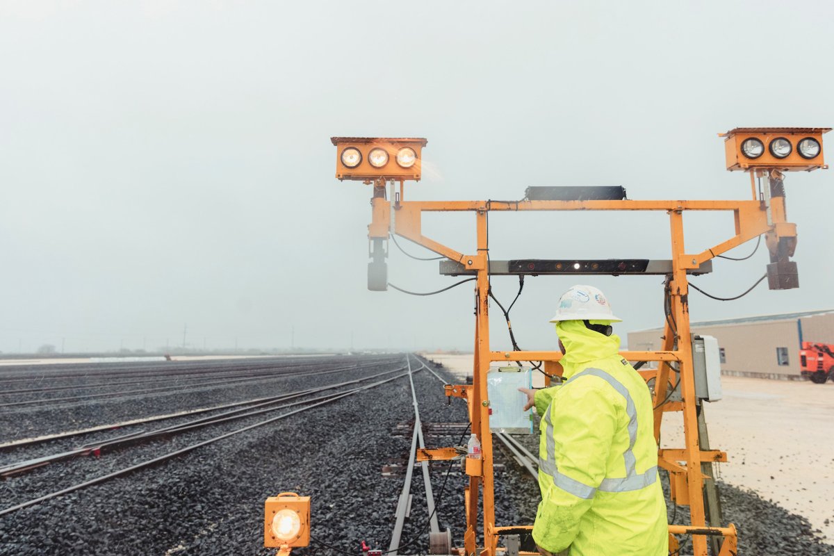 RailWorksCo's tweet photo. A little rain won’t stop us! RailWorks crews are committed to getting the job done, no matter what challenges arise during the project. Learn more about our work: https://t.co/HlJaFTKcLv https://t.co/8FaPsDRRWK